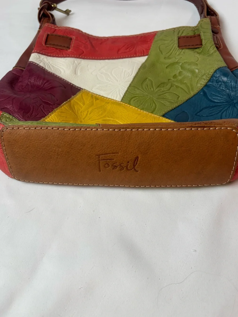 Fossil tooled leather